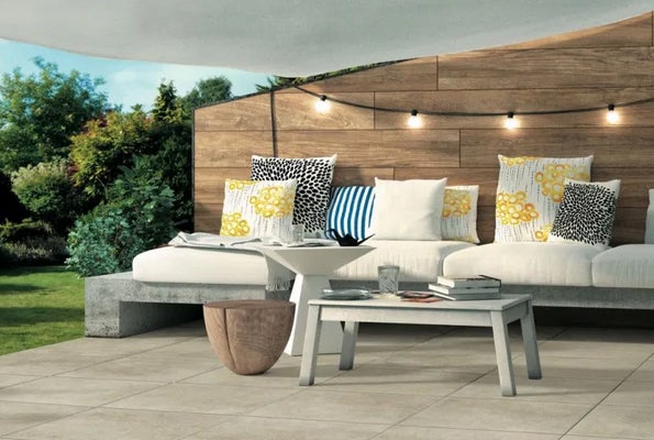 add character to a paver patio with a canopy